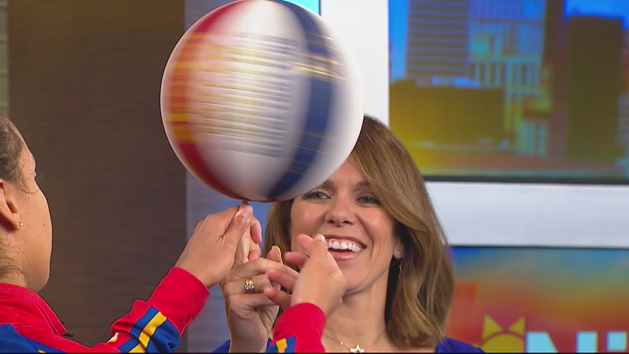 Globetrotter star Briana "Hoops" Green shows The Nine crew some moves