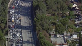 Car fire snarls traffic on 405 Freeway through San Fernando Valley