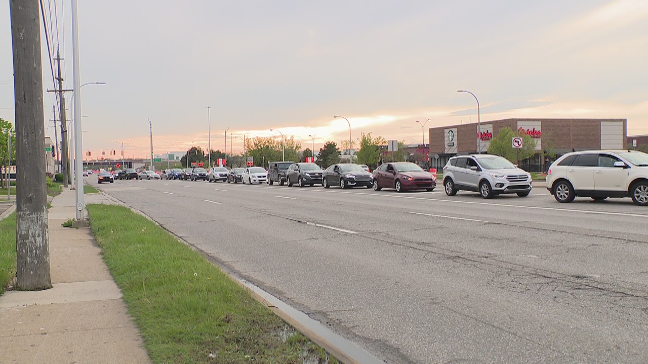 Graduates wait hours to get free Krispy Kreme donuts