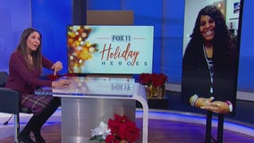 Holiday Heroes: Santa's helper in FedEx purple and a Christmas delivery for adoptive families