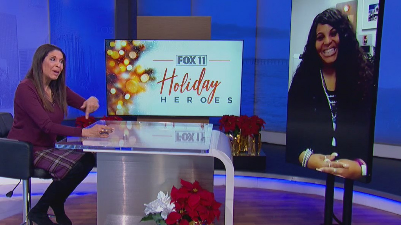 Holiday Heroes: Santa's helper in FedEx purple and a Christmas delivery for adoptive families