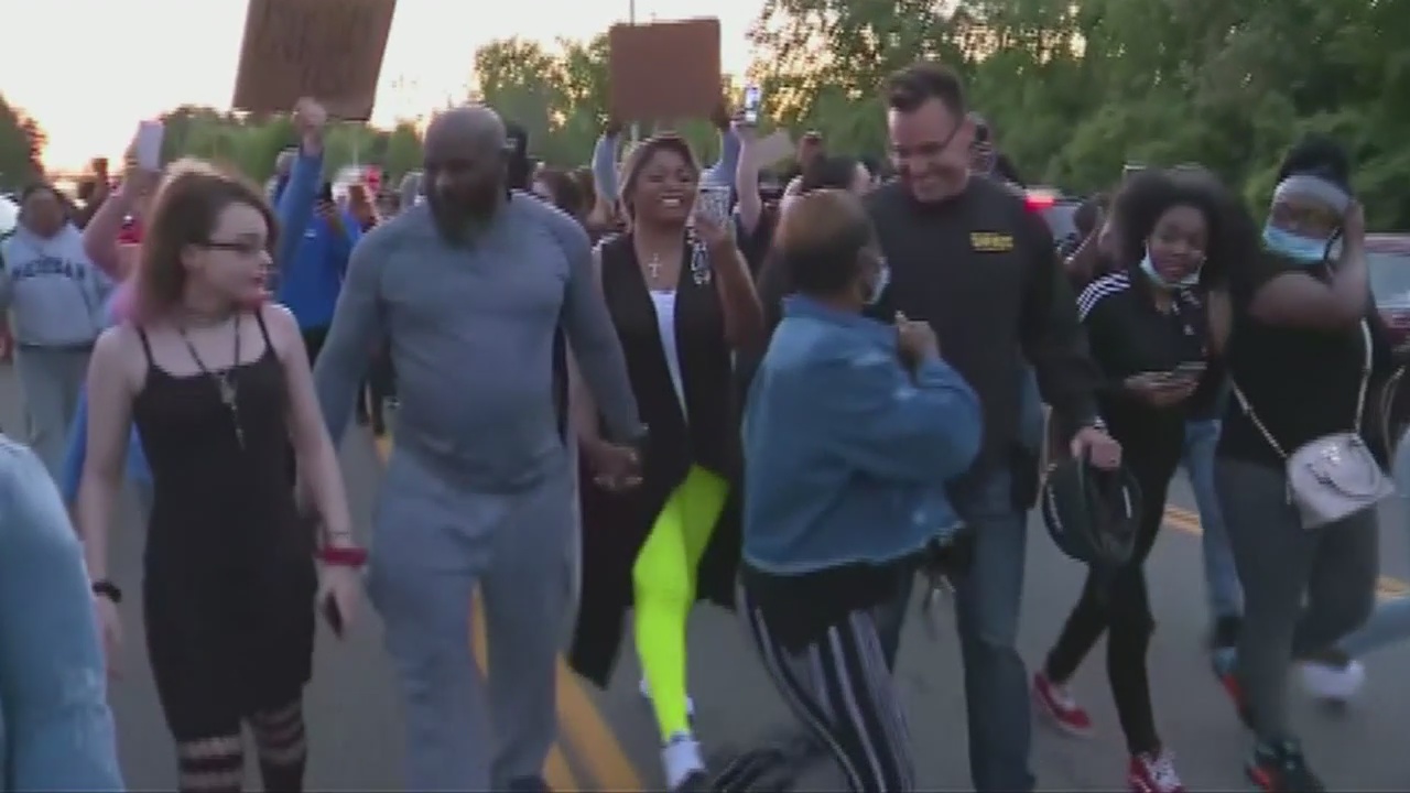 They chanted 'walk with us,' so he did... a candid conversation with Genesee County Sheriff Chris Swanson