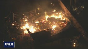 Fire still burning after fireworks explosion kills 2 in Ontario