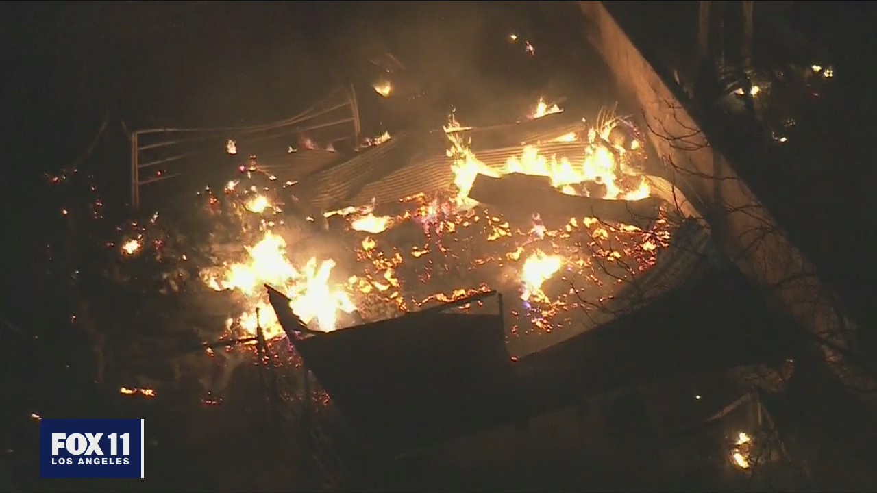 Fire still burning after fireworks explosion kills 2 in Ontario