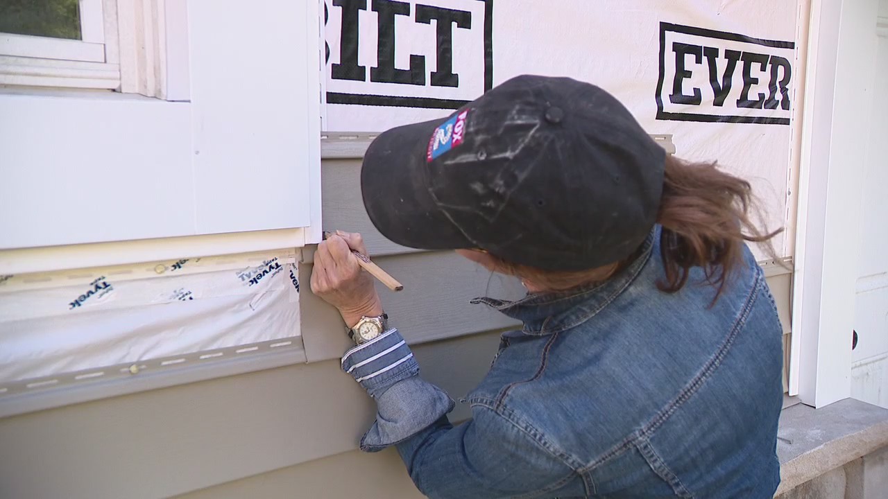 Jill of All Trades cuts vinyl siding pieces
