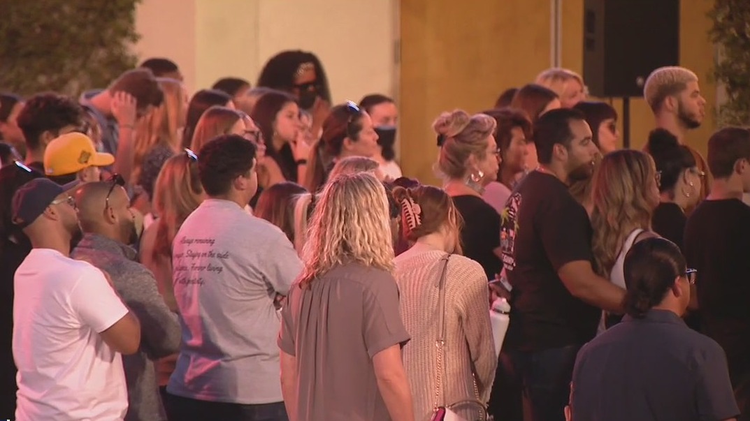 Movie theater shooting: Corona community holds vigil and memorial for victims