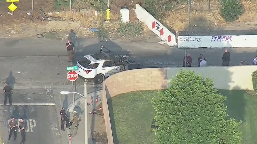Deputy shot in San Bernardino, vehicle found completely torched at scene