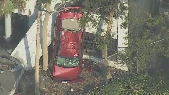 Car falls off parking garage in Downtown Los Angeles