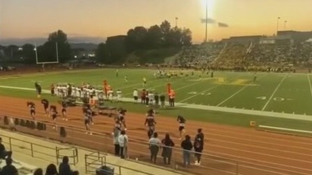 Cheer squad taunted with apparent racial slurs during high school football game