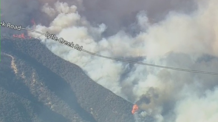 Wildfire in Fontana area torches buildings, threatening farm animals