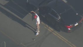 Police Chase: Suspect gets out of car, spikes phone to ground after pursuit across San Fernando Valley