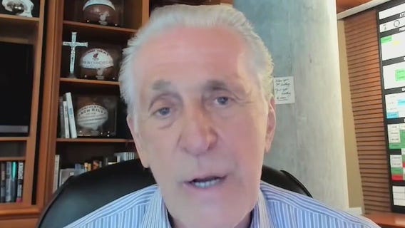 Former Lakers coach Pat Riley recalls the moment he found out star player Magic Johnson was HIV positive