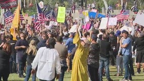 Demonstrators gather in downtown LA to protest COVID-19 vaccine mandates