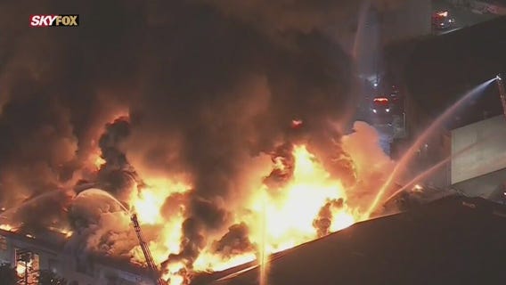 Large fire at a South Los Angeles commercial building causes roof to collapse