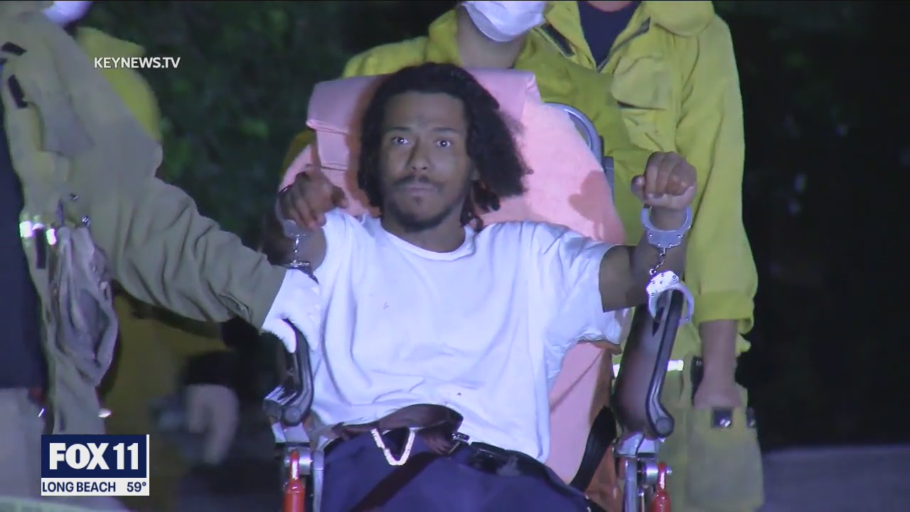 Murder suspect charged in killing of philanthropist