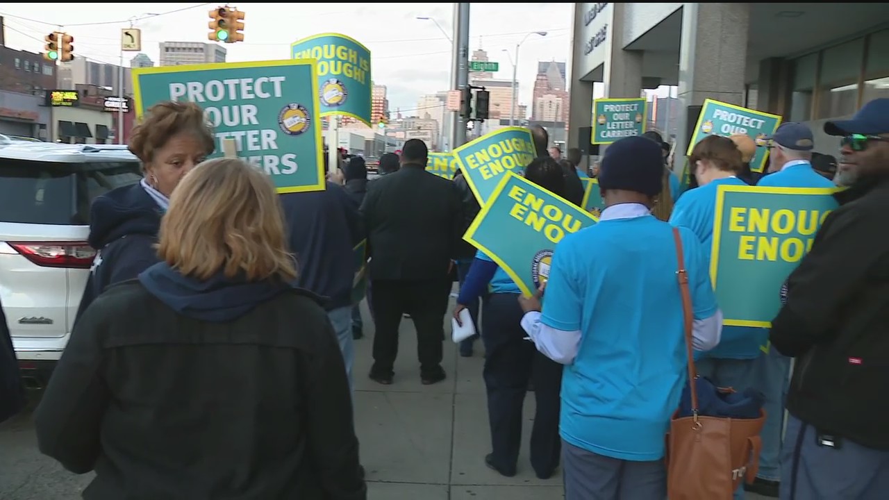 US postal carriers hold rally calling for more protection after rash of targeted crimes
