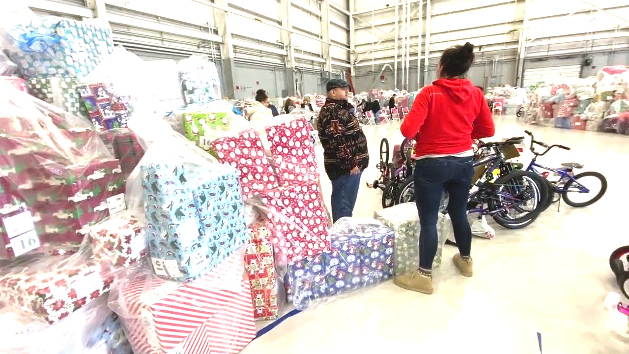 Waterford air hangar full of gifts for foster kids furthers one man's mission