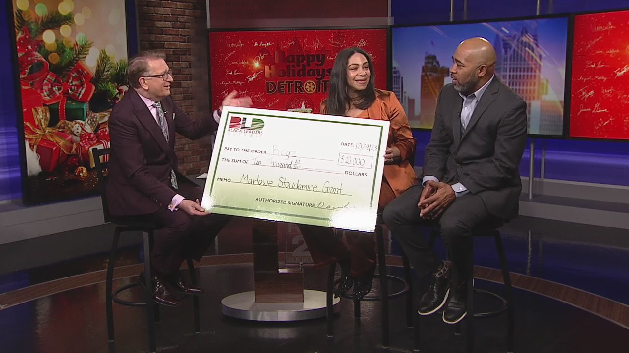 Black Leaders Detroit presents grant to local business owner