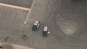 Motorcyclist killed after falling off parking garage