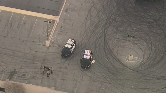 Motorcyclist killed after falling off parking garage