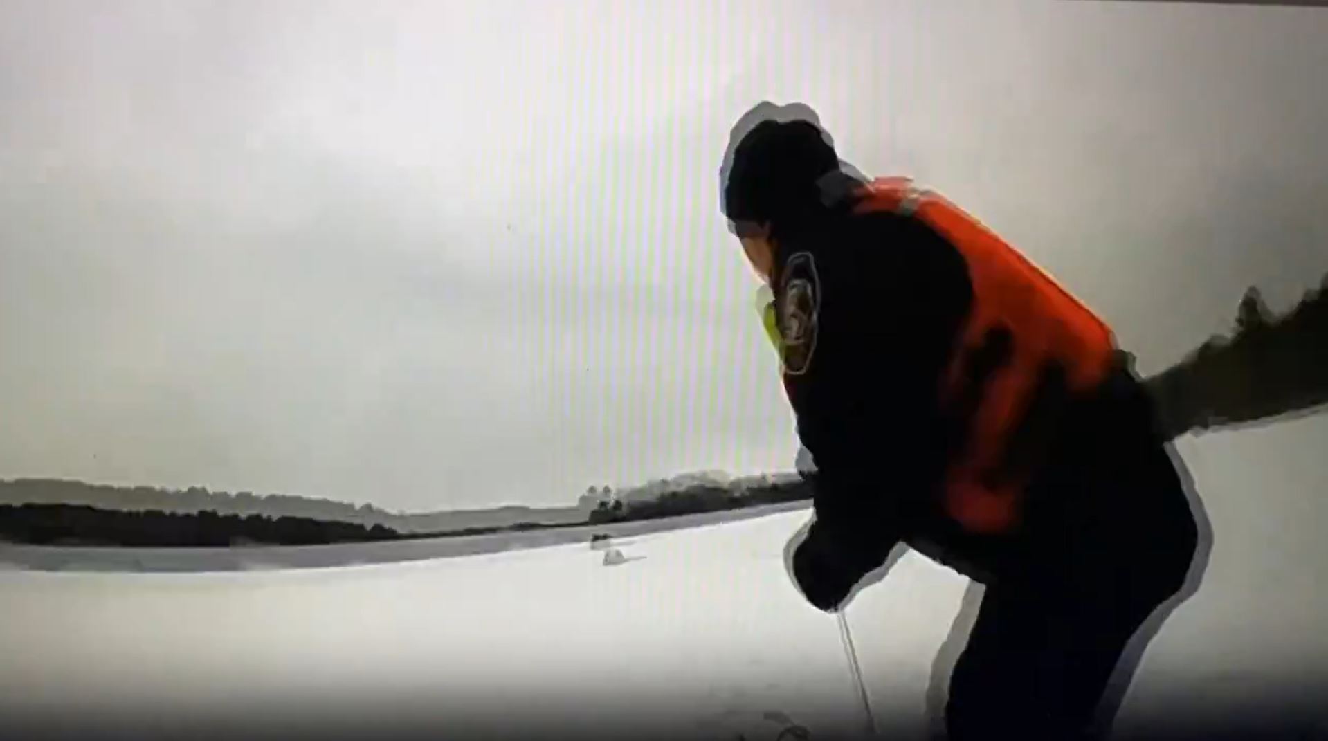 Michigan troopers rescue man stuck in ice