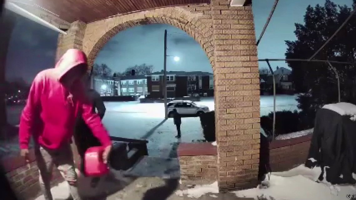 Porch set on fire in Detroit, 2 suspects charged