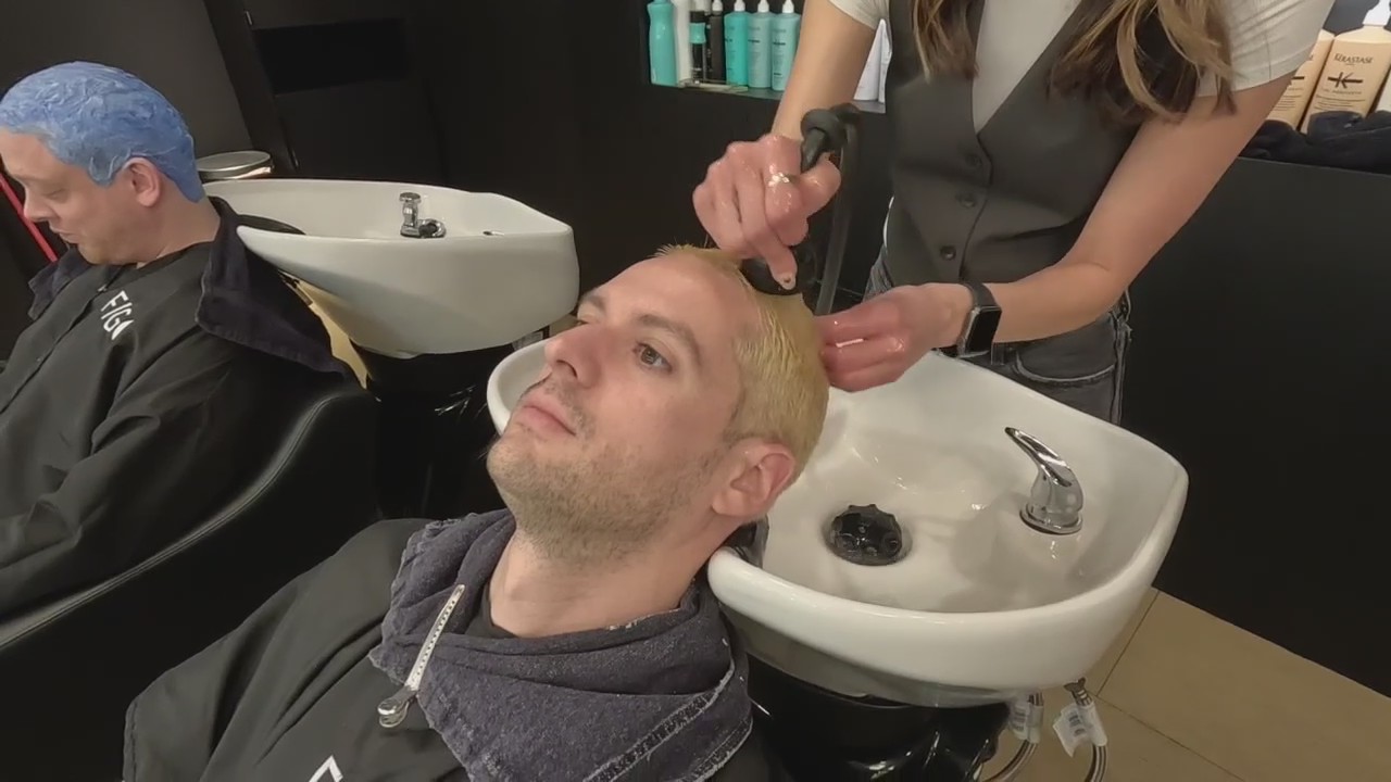 Lions fans going blue at Birmingham salon to celebrate St. Brown amid playoff run