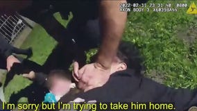 Suspect carrying baby tackled by LAPD officer