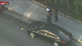 Possible drive-by shooter opens fire on pedestrians on sidewalk; 2 shot