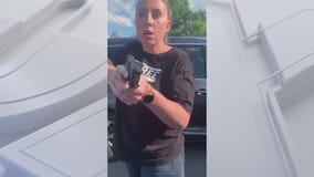 Online video shows woman pointing gun at black mom and teen in Lake Orion