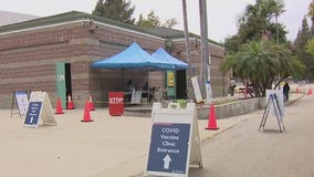 Officials hoping more take vaccine, booster shots amid surging cases