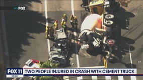 2 injured in crash involving cement truck