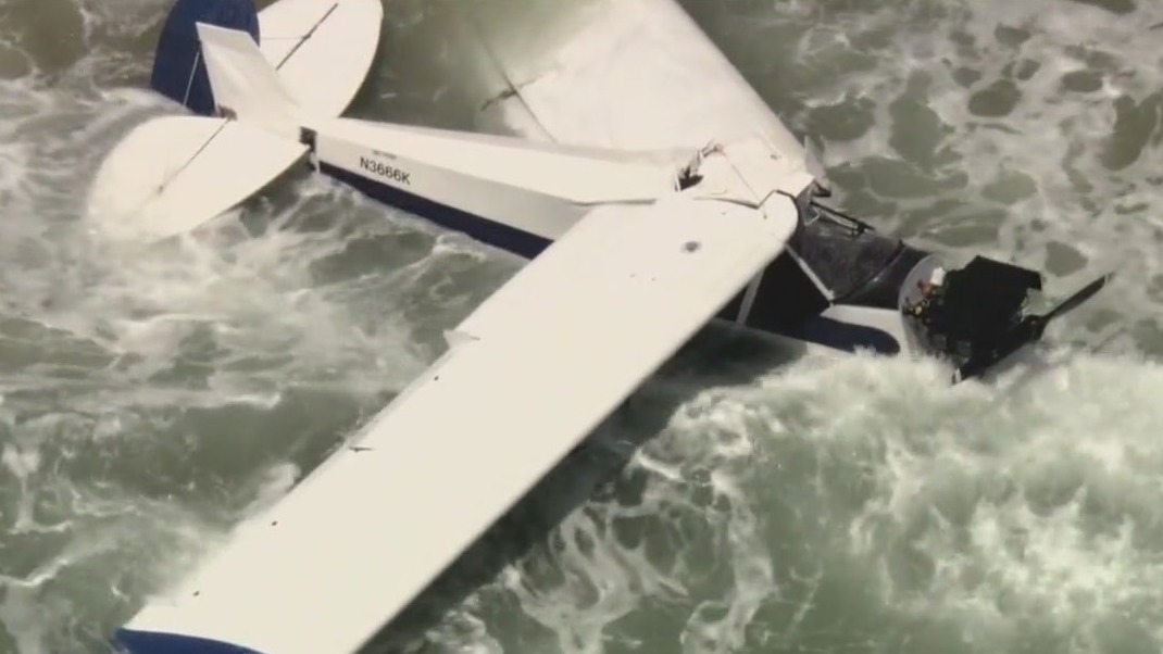 Pilot who crashed plane gets immediate help because of nearby lifeguard competition