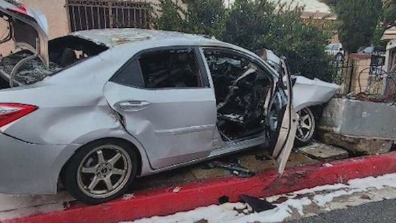 Officers rescue woman from burning car