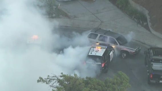 Police chase suspect floors gas pedal during standoff with officers