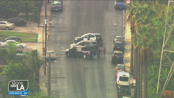 Search for suspect in Watts prompts school lockdown