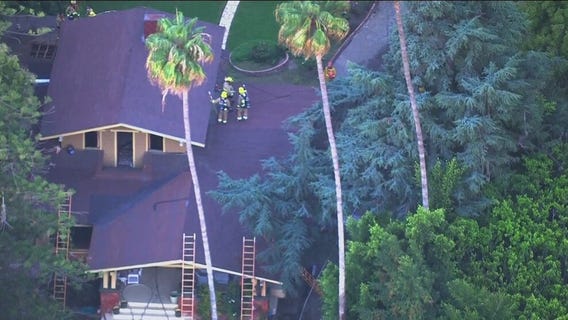 At least 1 killed in fatal house fire