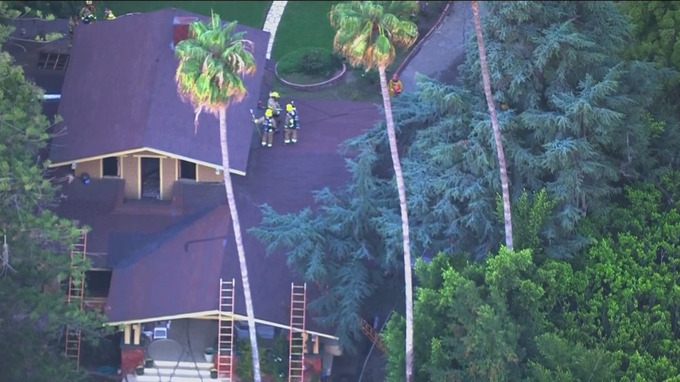 At least 1 killed in fatal house fire