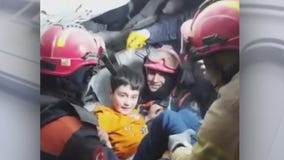 Children pulled alive from earthquake rubble