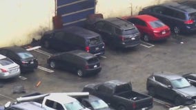 Cars damaged by tornado in Montebello