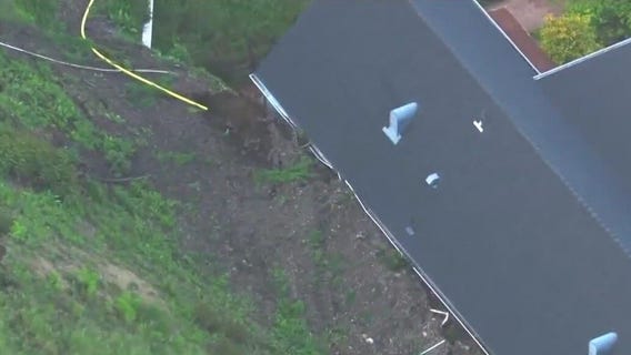 Hillside slips away behind Pacific Palisades home