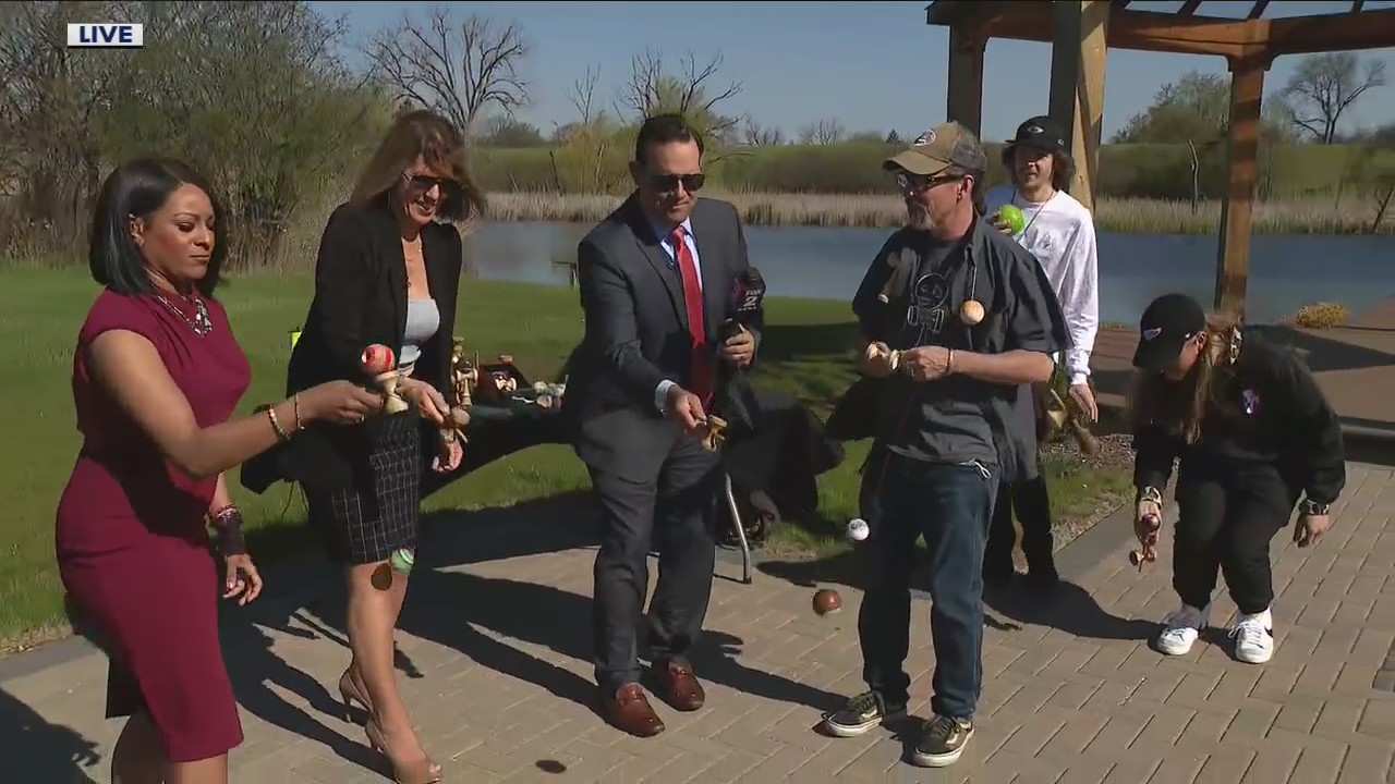 The Nine team tries to learn the kendama toy
