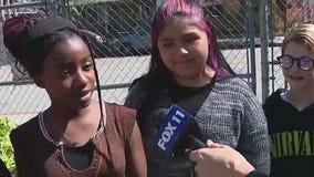 Kids discuss learning garden groundbreaking