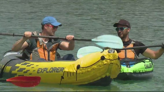 Crossing the Detroit River in inflatable kayaks
