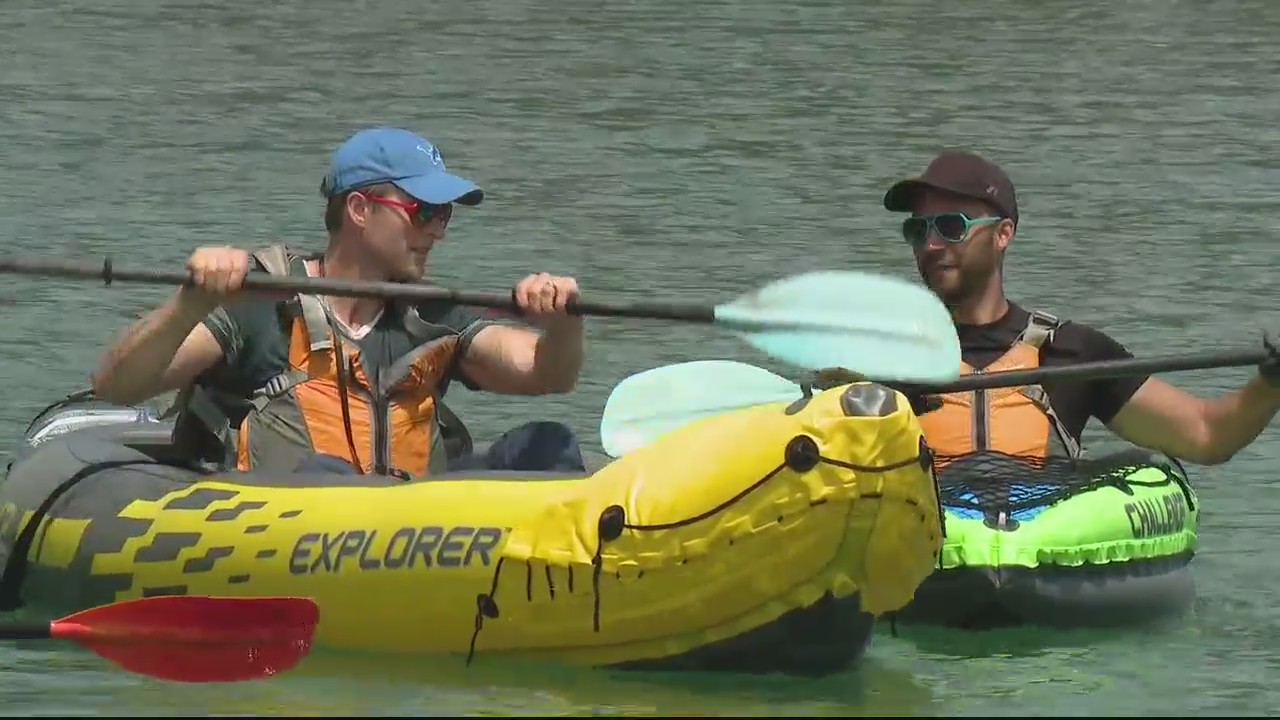 Crossing the Detroit River in inflatable kayaks