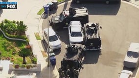 Armed suspect barricaded in Santa Clarita