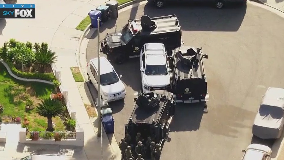Armed suspect barricaded in Santa Clarita