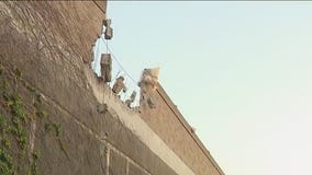 Debris rain down on South LA neighborhood after freeway crash