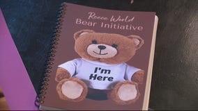 Mother of special needs child exercising new way of notify others of a child who is nonverbal