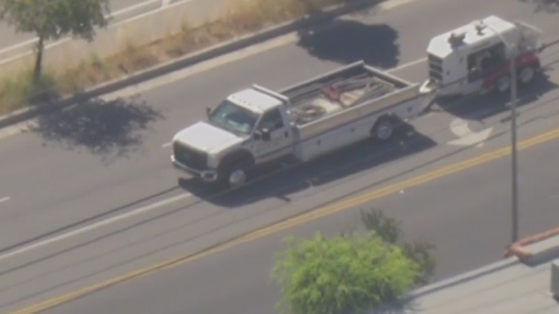 Pursuit suspect in standoff with police